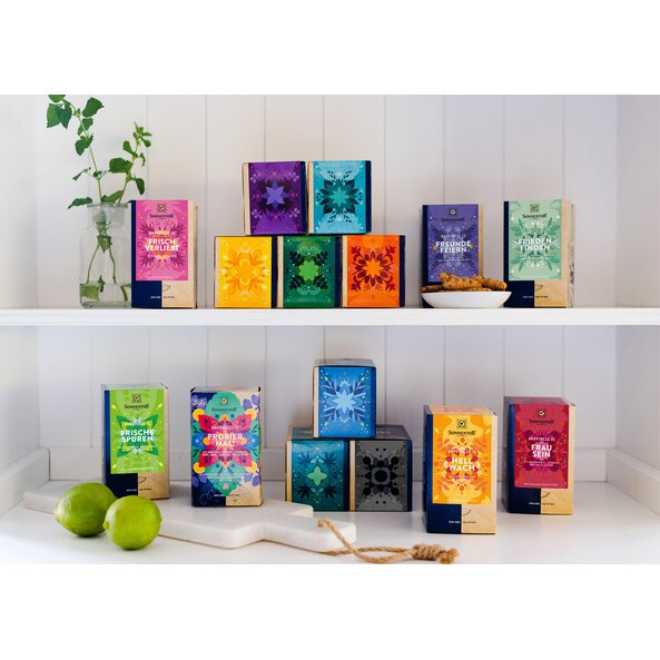 In the picture you can see all the tea packs of the series Happiness Is. They are distributed on a shelf on two floors